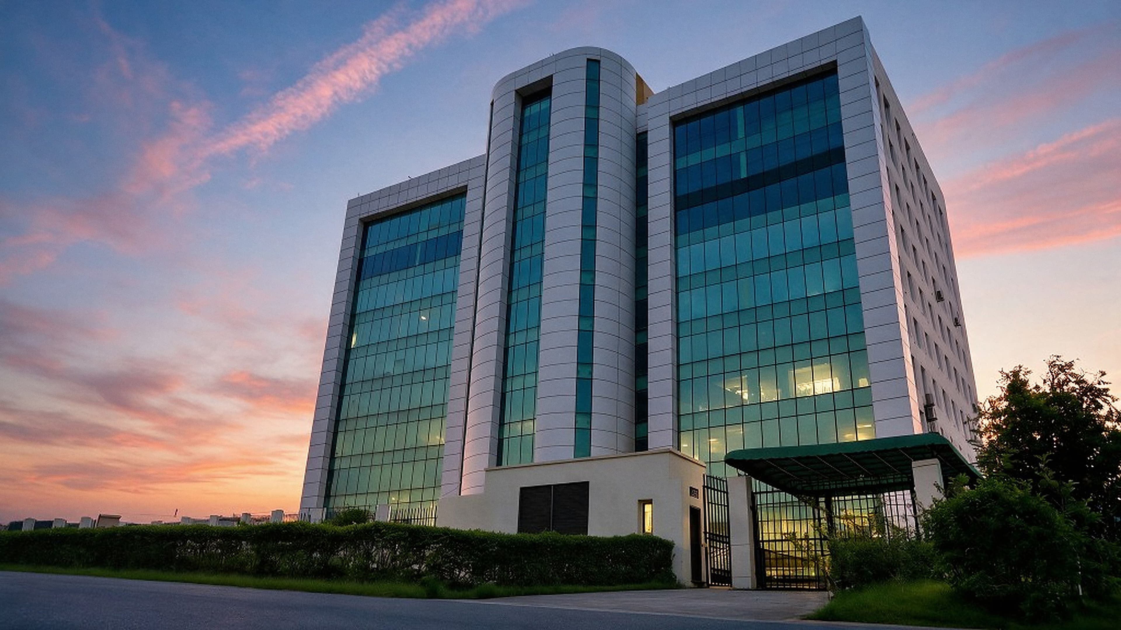 Modern office building at sunset